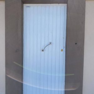 Porte battante tole nervuree 01